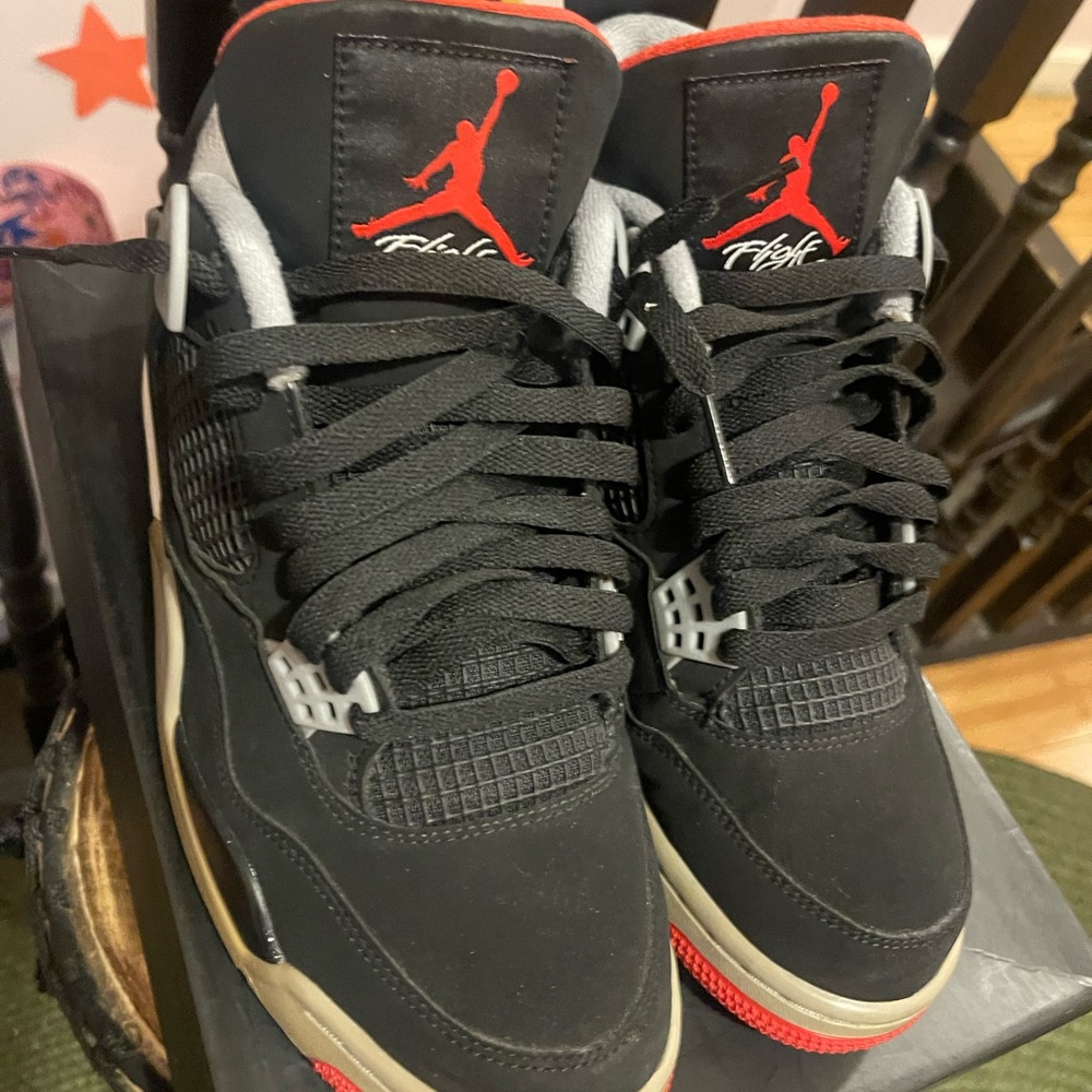 Jordan 4 Retro Black and Red Sneakers